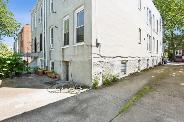 432 Amboy St, Brooklyn, NY 11212 - view of home's exterior with stucco siding