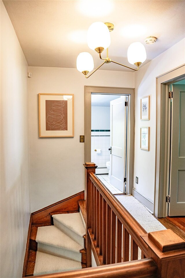 222 Lakeside Rd, Newburgh, NY 12550 - staircase with a chandelier