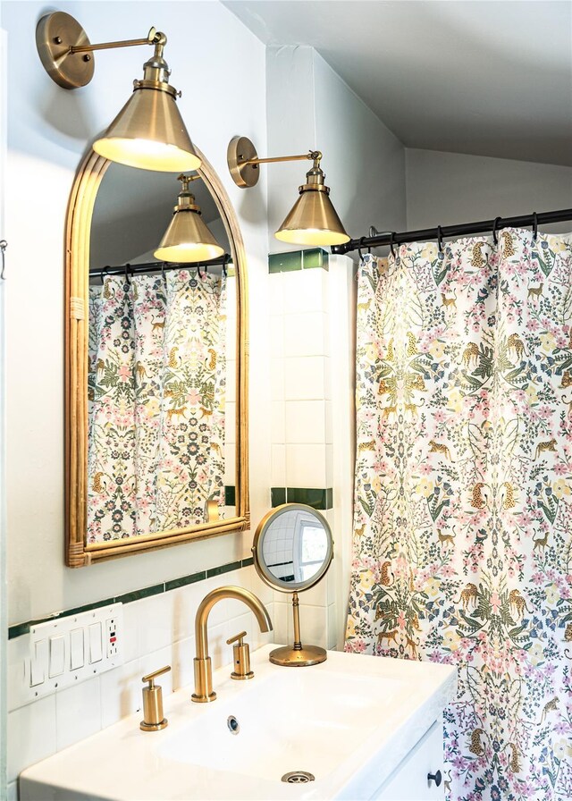 222 Lakeside Rd, Newburgh, NY 12550 - bathroom with vanity and backsplash