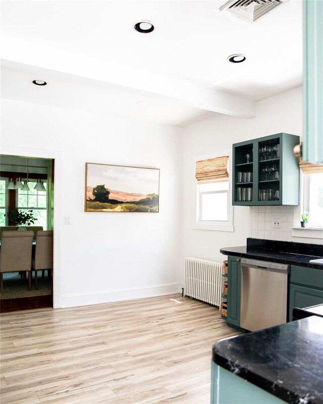 222 Lakeside Rd, Newburgh, NY 12550 - kitchen with stainless steel dishwasher, radiator, plenty of natural light, beamed ceiling, and recessed lighting