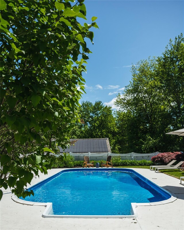 222 Lakeside Rd, Newburgh, NY 12550 - view of swimming pool with a fenced backyard, a patio, and an outbuilding