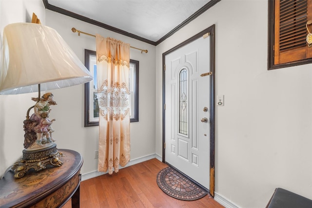 7 Crestwood Trl, Monroe, NY 10950 - entryway with ornamental molding, wood finished floors, and baseboards