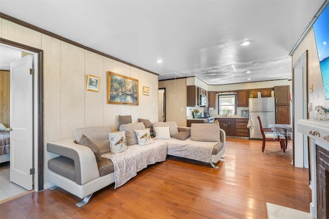 7 Crestwood Trl, Monroe, NY 10950 - living area featuring light wood finished floors, recessed lighting, and ornamental molding