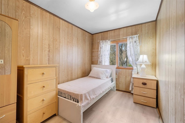 7 Crestwood Trl, Monroe, NY 10950 - bedroom featuring wooden walls and light wood finished floors