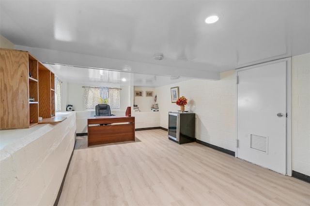 7 Crestwood Trl, Monroe, NY 10950 - interior space with light wood-style floors, concrete block wall, and an office area