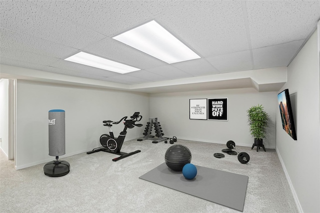 15 Elizabeth Ln, Quogue, NY 11959 - exercise room with a paneled ceiling, carpet flooring, and baseboards