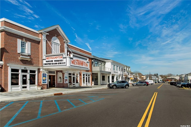 15 Elizabeth Ln, Quogue, NY 11959 - view of asphalt street with curbs, sidewalks, and a residential view