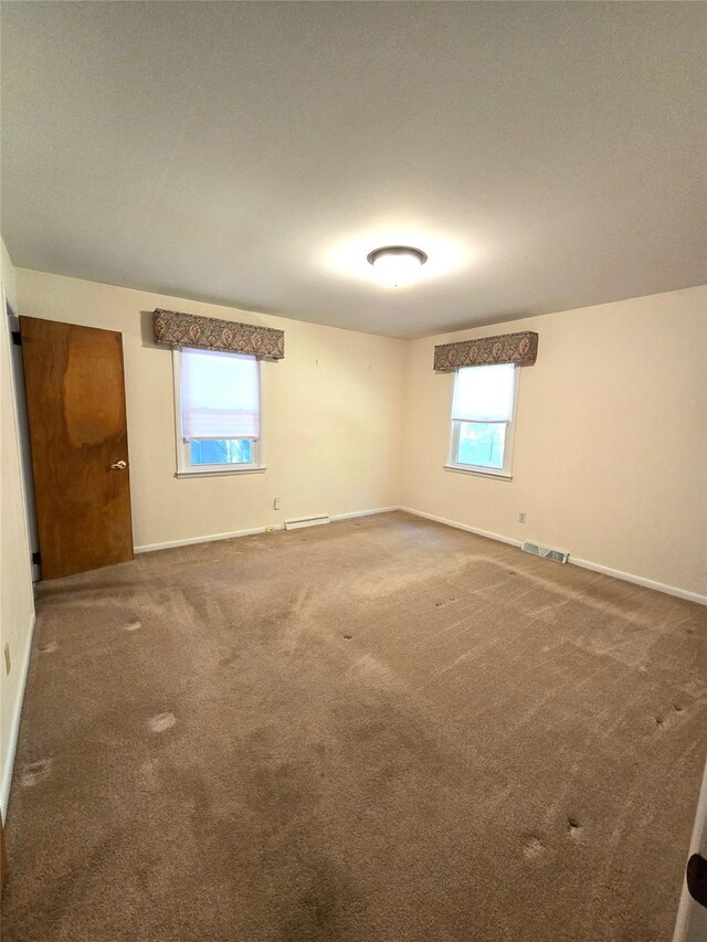 31 Whittier Blvd, Poughkeepsie, NY 12603 - carpeted spare room with baseboards