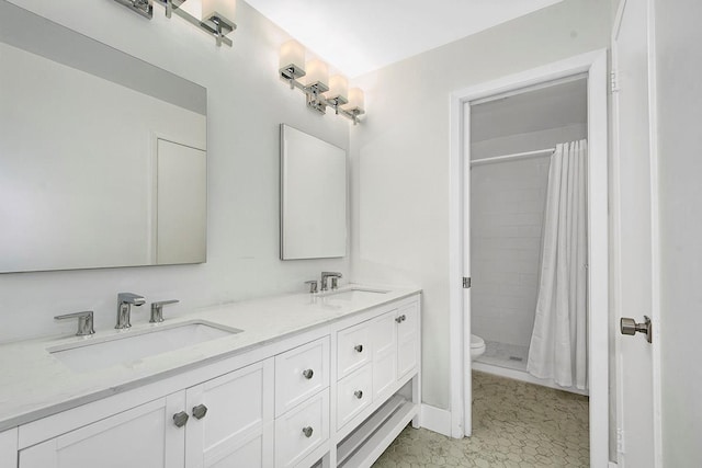107 N Broadway Unit 201, White Plains, NY 10603 - full bath with toilet, double vanity, and a shower with shower curtain