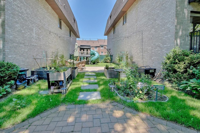 107 N Broadway Unit 201, White Plains, NY 10603 - surrounding community with a vegetable garden