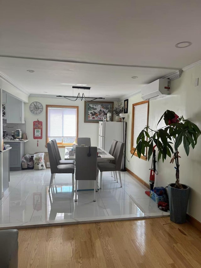 58-16 185th St, Fresh Meadows, NY 11365 - dining area with a wall mounted AC, crown molding, baseboards, and light wood finished floors