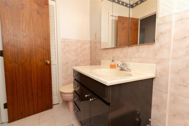 28-06 34th Ave, Astoria, NY 11106 - bathroom featuring tile patterned floors, toilet, vanity, and wallpapered walls