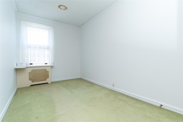 28-06 34th Ave, Astoria, NY 11106 - empty room featuring carpet, radiator, crown molding, and baseboards