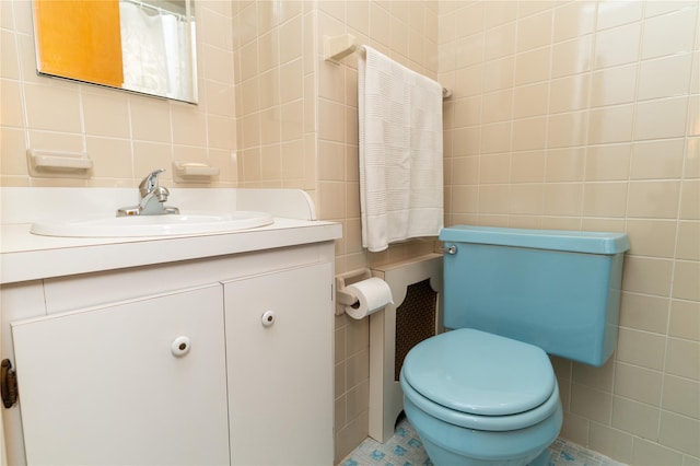 28-06 34th Ave, Astoria, NY 11106 - bathroom with tile walls, toilet, and vanity