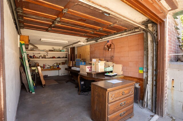 28-06 34th Ave, Astoria, NY 11106 - garage featuring a workshop area