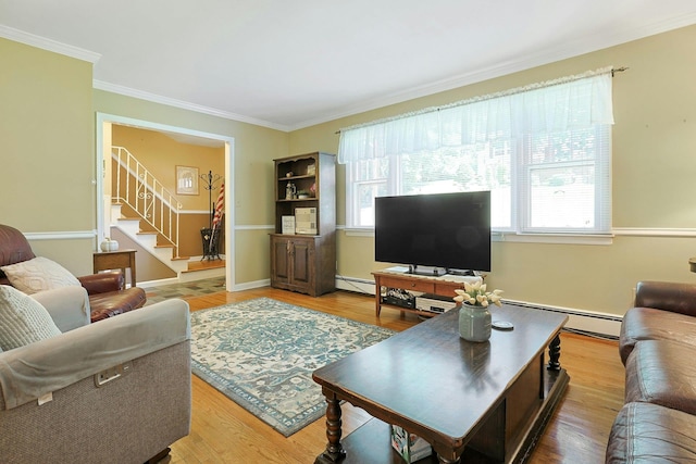 53 Prior Pl, Yonkers, NY 10710 - living room with a baseboard radiator, crown molding, stairway, and wood finished floors