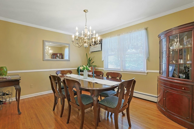 53 Prior Pl, Yonkers, NY 10710 - dining room featuring a baseboard heating unit, a chandelier, light wood-style flooring, crown molding, and baseboards