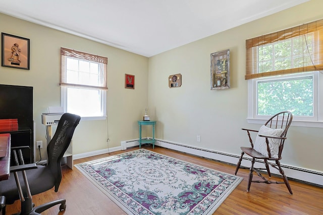 53 Prior Pl, Yonkers, NY 10710 - office space with wood finished floors and a baseboard heating unit