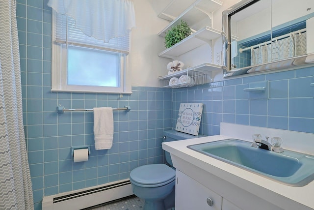 53 Prior Pl, Yonkers, NY 10710 - full bath featuring baseboard heating, toilet, tile walls, vanity, and a shower with shower curtain