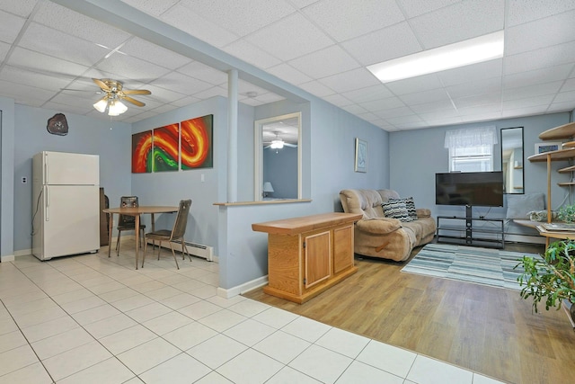 53 Prior Pl, Yonkers, NY 10710 - living area with a paneled ceiling, ceiling fan, baseboards, and light tile patterned floors