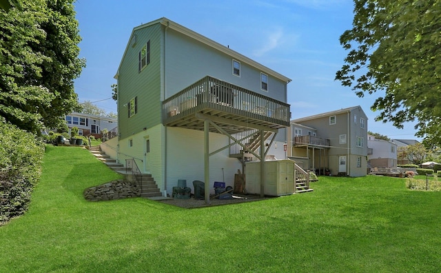 53 Prior Pl, Yonkers, NY 10710 - back of house with stairway, a wooden deck, and a yard