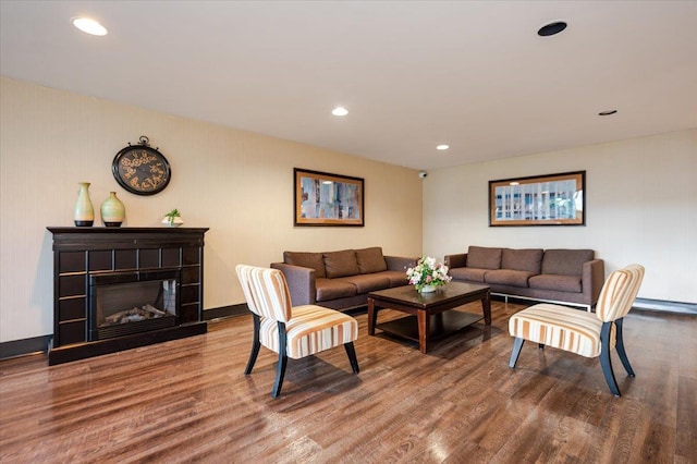 16 Main St Unit 3Y, East Rockaway, NY 11518 - living area featuring wood finished floors, recessed lighting, a fireplace, and baseboards