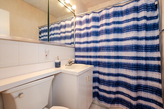 16 Main St Unit 3Y, East Rockaway, NY 11518 - bathroom with vanity, toilet, and curtained shower