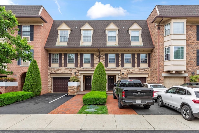 1229 Estates Ln Triplex, Unit Triplex, Bayside, NY 11360 - multi unit property featuring driveway, roof with shingles, a garage, and brick siding