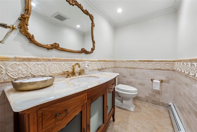 1229 Estates Ln Triplex, Unit Triplex, Bayside, NY 11360 - bathroom featuring baseboard heating, tile walls, vanity, toilet, and wainscoting
