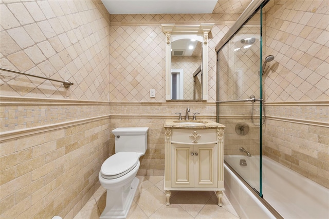 1229 Estates Ln Triplex, Unit Triplex, Bayside, NY 11360 - bathroom with tile patterned floors, tile walls, washtub / shower combination, toilet, and vanity