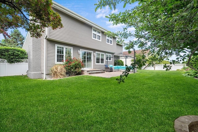 18 Stirrup Ln, Glen Cove, NY 11542 - back of property with outdoor lounge area and a patio