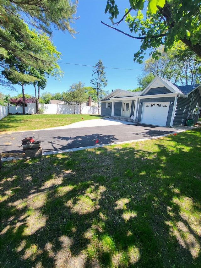1017 Fire Island Ave, Bay Shore, NY 11706 - view of front of house featuring an attached garage and driveway