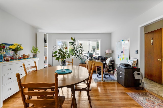 11 Parsons St, Harrison, NY 10528 - dining room featuring light wood-style floors and an office area