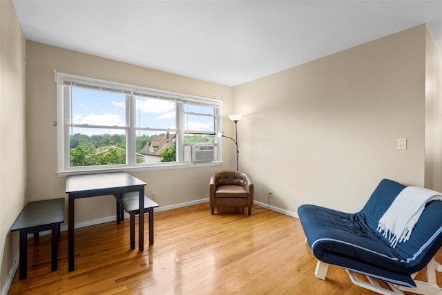11 Parsons St, Harrison, NY 10528 - sitting room featuring cooling unit, wood finished floors, and baseboards