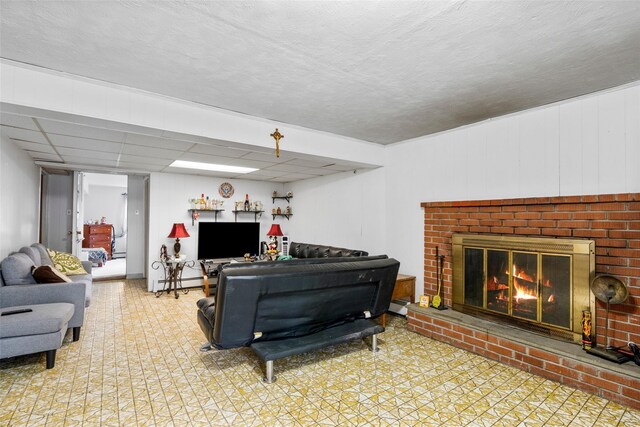 11 Parsons St, Harrison, NY 10528 - living area with a baseboard heating unit and a fireplace