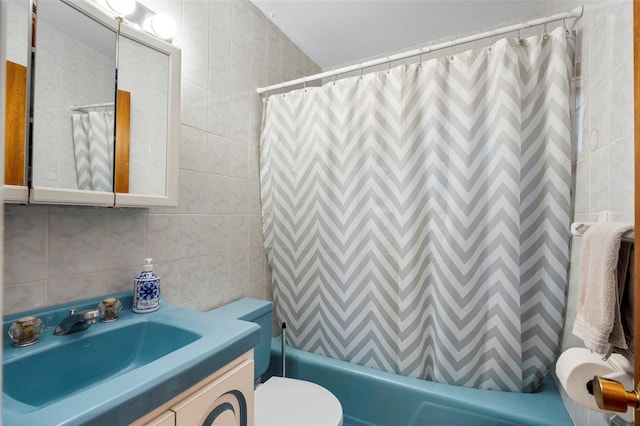 11 Parsons St, Harrison, NY 10528 - full bath with vanity, toilet, tile walls, and shower / bath combination with curtain