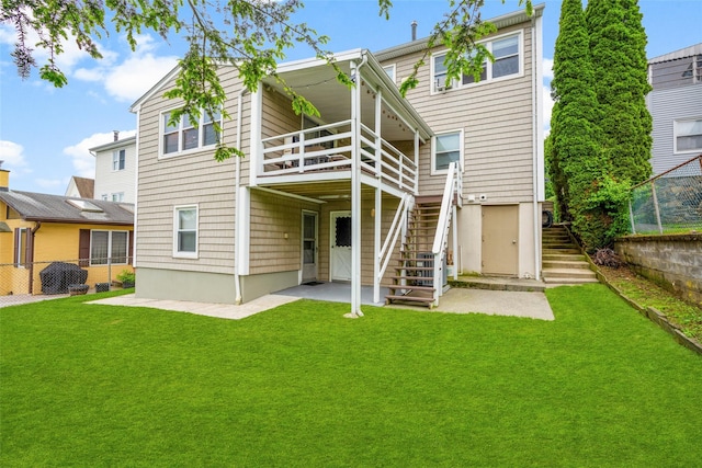 11 Parsons St, Harrison, NY 10528 - rear view of house featuring stairway, a patio, and a wooden deck