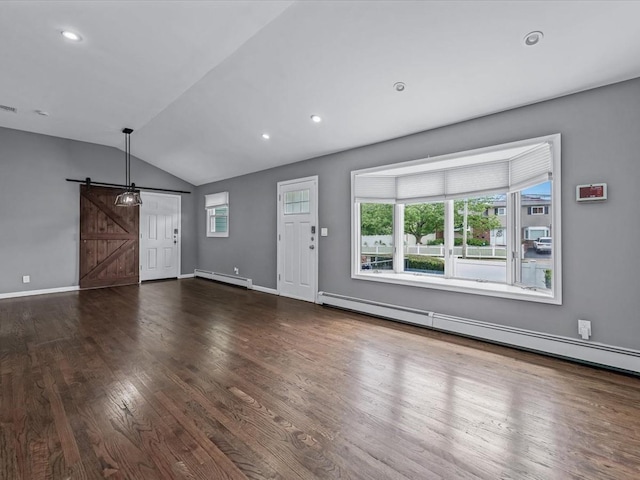 251 Woods Rd, North Babylon, NY 11703 - unfurnished living room with a barn door, baseboard heating, vaulted ceiling, wood finished floors, and baseboards