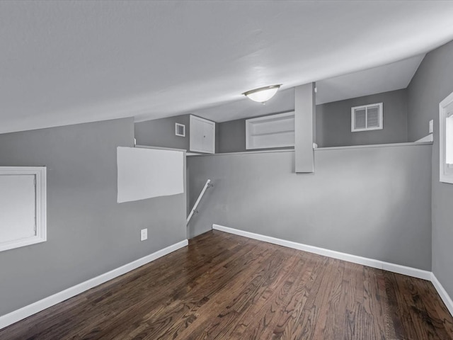 251 Woods Rd, North Babylon, NY 11703 - below grade area with wood finished floors and baseboards