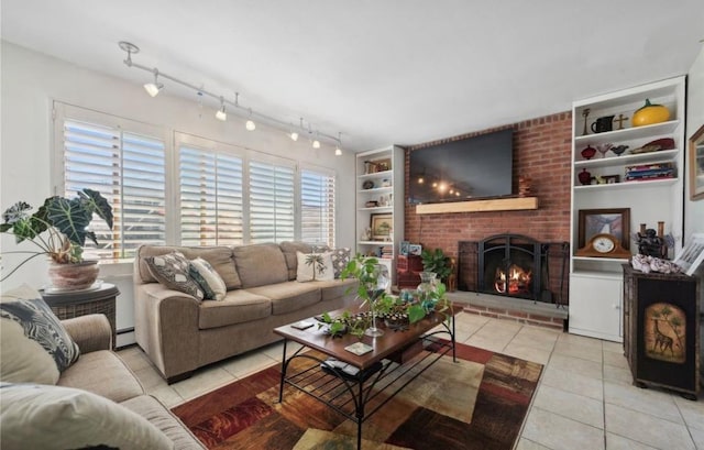 56 Yacht Club Rd, Babylon, NY 11702 - living area featuring light tile patterned floors, built in features, a brick fireplace, track lighting, and a baseboard heating unit