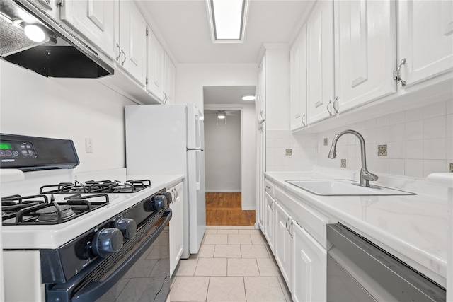 415 Gramatan Ave Unit 2C, Mount Vernon, NY 10552 - kitchen with range with gas cooktop, ventilation hood, dishwasher, a sink, and white cabinetry