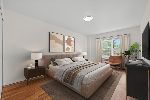 415 Gramatan Ave Unit 2C, Mount Vernon, NY 10552 - bedroom with light wood finished floors and baseboards