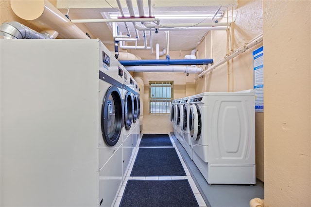 415 Gramatan Ave Unit 2C, Mount Vernon, NY 10552 - communal laundry room featuring washer and clothes dryer and tile patterned flooring
