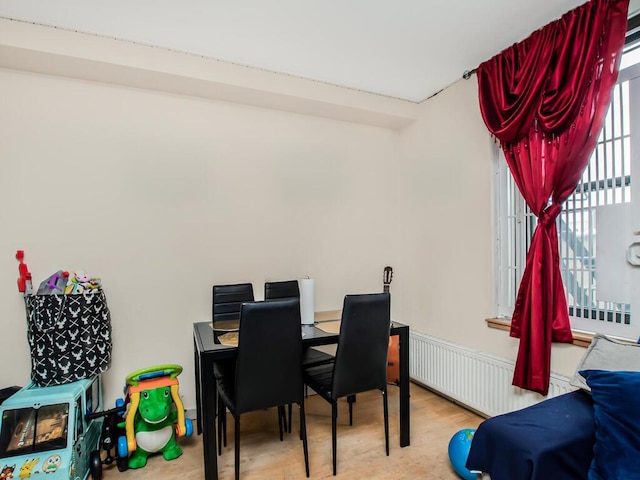 1347 Bristow St Unit 4B, Bronx, NY 10459 - dining space featuring radiator and wood finished floors
