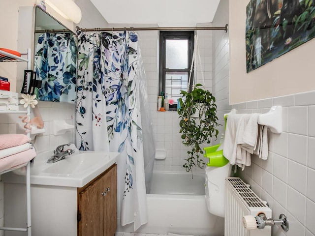 1347 Bristow St Unit 4B, Bronx, NY 10459 - full bath featuring tile walls, vanity, shower / bath combo with shower curtain, and radiator