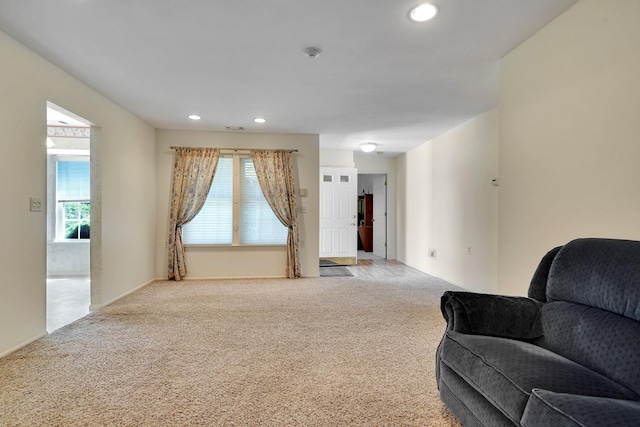 192 Theodore Dr, Coram, NY 11727 - living area with light colored carpet and recessed lighting