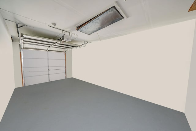 192 Theodore Dr, Coram, NY 11727 - garage featuring a garage door opener