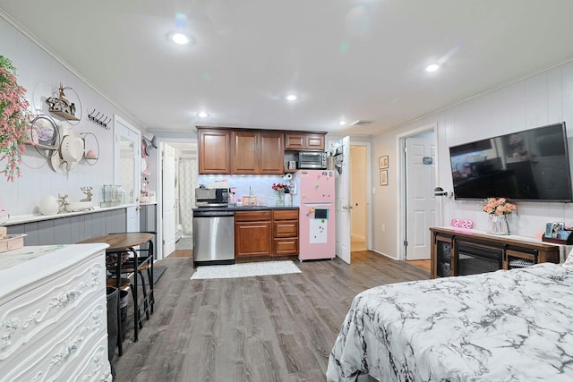 10 Cregan Pl, Monroe, NY 10950 - bedroom featuring freestanding refrigerator, crown molding, wood finished floors, and recessed lighting