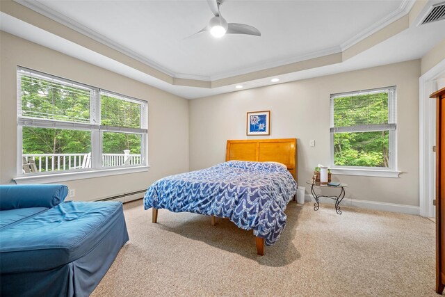 72 Greencrest Rd, Goshen, NY 10924 - carpeted bedroom featuring ornamental molding, a tray ceiling, a baseboard radiator, baseboards, and ceiling fan