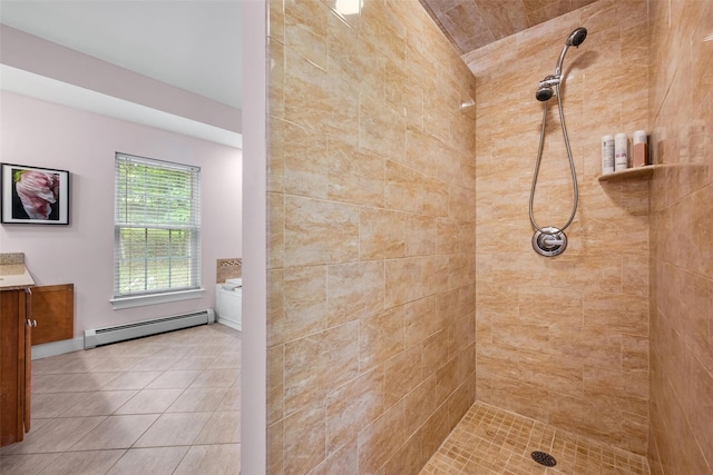 72 Greencrest Rd, Goshen, NY 10924 - full bathroom with a baseboard heating unit, vanity, a tile shower, and tile patterned floors
